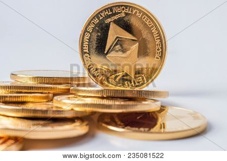 Golden Bitcoin Coins On A Dark Background With Euro Coins. Virtual Currency. Crypto Currency. New Vi