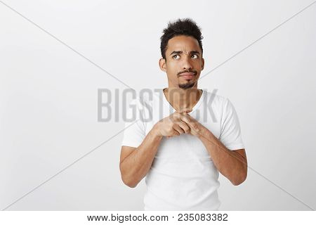 Brother Is Not Sure, Hesitating, Being Insecure. Portrait Of Worried Stressed Dark-skinned Guy With 