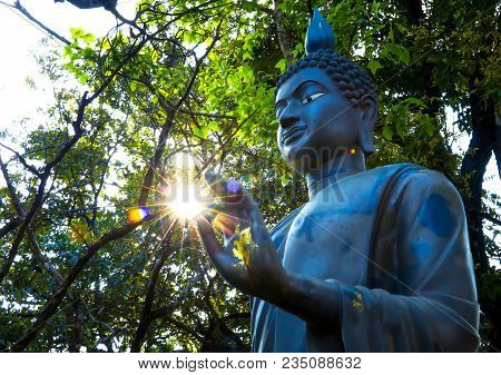 The Sun In The Hands Of The Buddha Statue In Buddhism.
