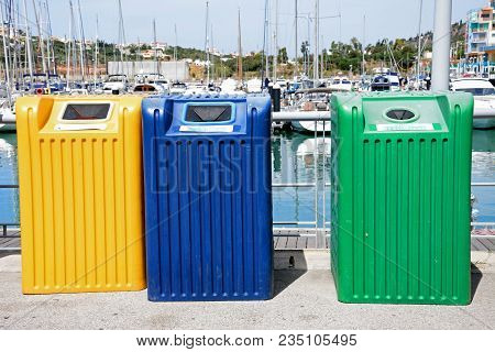 Albufeira, Portugal - June 8, 2017 - Recycling Bins In The Marina, Albufeira, Algarve, Portugal, Eur