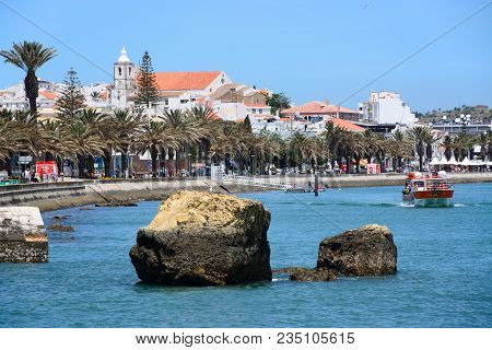Lagos, Portugal - June 9, 2017 - View Along The River Bensafrim With The Promenade And Waterfront Bu