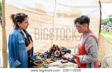 Goren, Israel, April 06, 2018 : Fortune Teller On Tarot Cards - Participant Of Knight Festival Answe