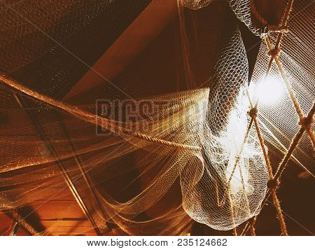 Sea Nets Background, Fishing Equipment And Old Tackle As A Decoration For Marine Style Concept