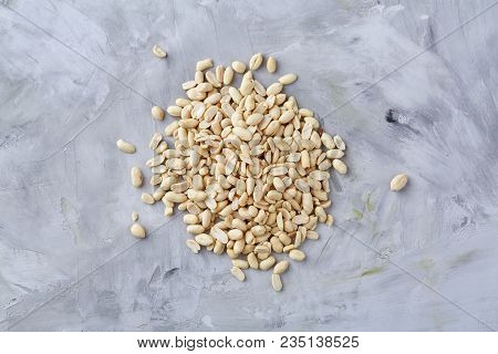 Pile Of Peelled Peanuts Isolated On White Textured Background, Background, Top View, Close-up, Selec