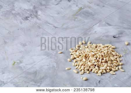 Pile Of Peelled Peanuts Isolated On White Textured Background, Background, Top View, Close-up, Selec
