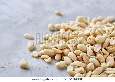 Pile Of Peelled Peanuts Isolated On White Textured Background, Background, Top View, Close-up, Selec