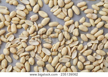 Pile Of Peelled Peanuts Isolated On White Textured Background, Background, Top View, Close-up, Selec