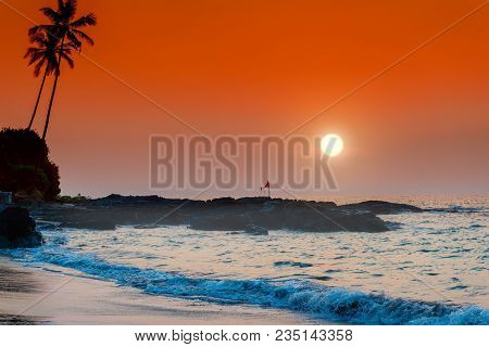 Tropical Landscape At Sunset. Sea Sits In The Sea. Tinted.