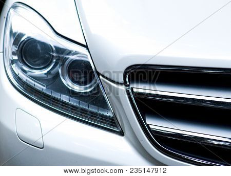 Detail Of A White Car - Front Right Light And Mask Grid.detail Of White Car - Front Right Lamp And M