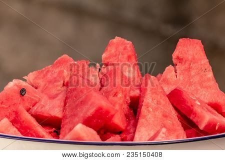 Fresh slices of ripe organic red watermelon, Citrullus lanatus
