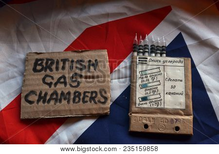 The scandal about poisoning of former Russian spy and killing his domestic pets cat and Guinean pigs. Animal abuse.Concept. British Flag background.April 7, 2018 in Kiev,Ukraine