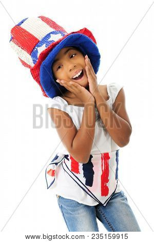 An elementary girl acting silly in her sparkly Uncle Sam hat and red, white and blue scarf.  On a white background.