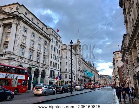 LONDON - APRIL 4, 2018: Pedestrian and vehicular traffic on Piccadilly, Westminster, London, UK.