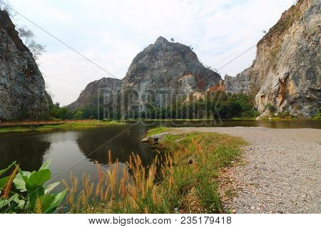 Rocky Mountain With Water Lake Of Khao Ngu Stone Park , Ratchaburi , Thailand.