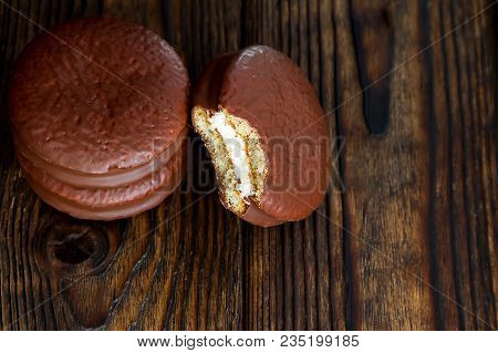 Three Choco Pie Sweet Dessert On The Village Dark Old Table In Moodle Style