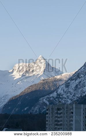 The Village Near The Mountain Peaks. Dombay Rocky Mountains