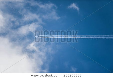 Plane On The Sky Lets The Track In The Clouds