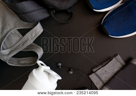 Frame With The Image Of A Sport Uniform, Shoes, Backpack, Tops, Titsy, Shaker, Headphones On Black B