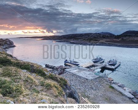 Fishing Boat With Fishing Rods Floating At Shore, Evening Colorful  Sea. Background Beautiful Sky