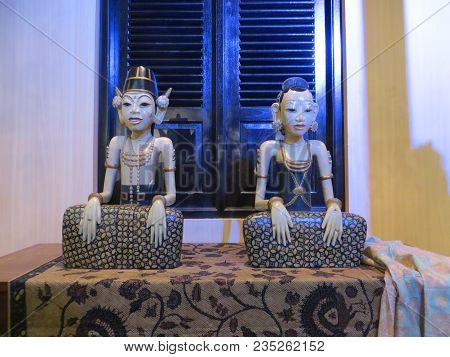 Jakarta, Indonesia - June 8, 2017: A Pair Of Statues Of Traditional Javanese Couple.