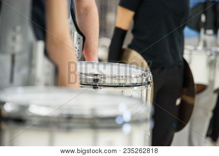 Details From A Music, Show And Marching Band. Playing Musicians With Percussion Instruments During A