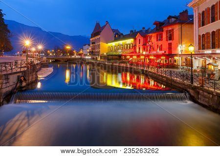 Thiou River During Morning Blue Hour In Old City Of Annecy, Venice Of The Alps, France