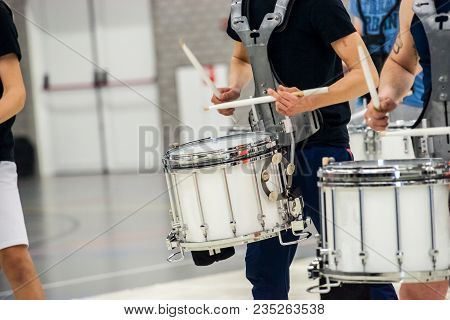 Details From A Music, Show And Marching Band. Playing Musicians With Percussion Instruments During A