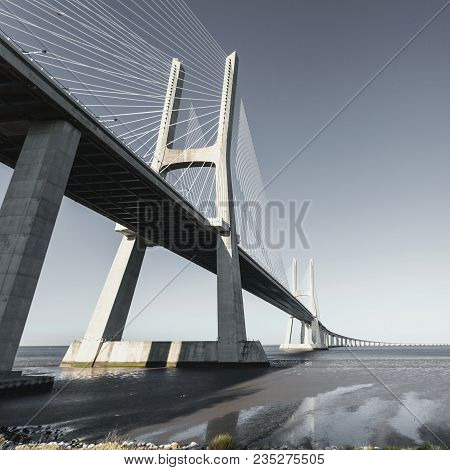 Vasco Da Gama Bridge In Lisbon, Portugal. Photo Afternoon On A Sunny Day