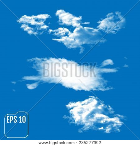 Three Realistic Clouds On A Sky-blue Background. Vector Illustra