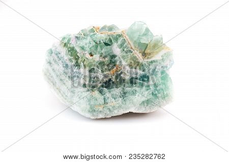 Light Colored Gem Rock Stone Against An Isolated White Background.