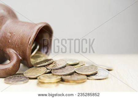 Ancient Jug With Coins. Old Coins In A Pot. Savings