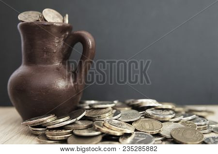 Ancient Jug With Coins. Old Coins In A Pot. Savings