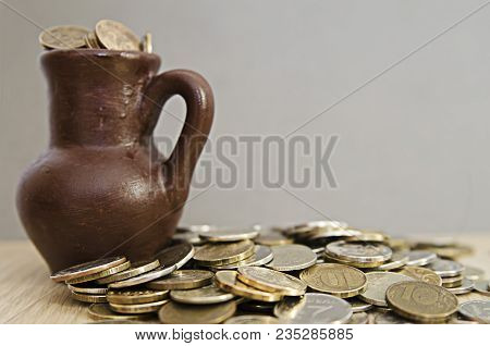 Ancient Jug With Coins. Old Coins In A Pot. Savings