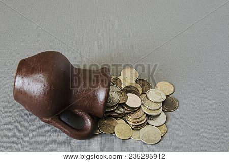 Ancient Jug With Coins. Old Coins In A Pot. Savings
