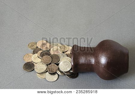 Ancient Jug With Coins. Old Coins In A Pot. Savings