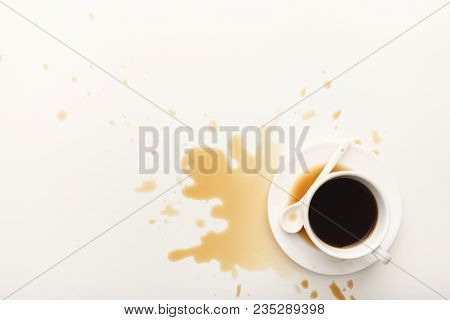 Cup Of Espresso And Coffee Spilt On White Isolated Background, Top View. Mockup For Grunge Advertise