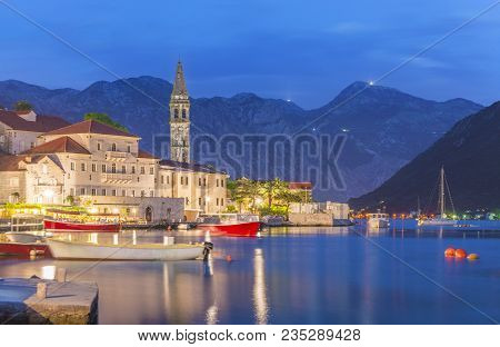 Night Panoramic View Of Perast Old Town With Famous Campanile Of St. Nikola Church On The Bay Of Kot