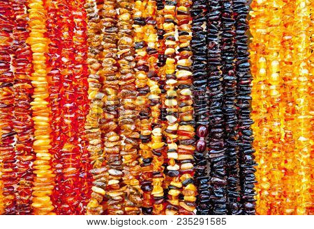 Succinite. Amber necklace. Amber of different colors and sizes.