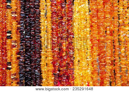 Succinite. Amber necklace. Amber of different colors and sizes.