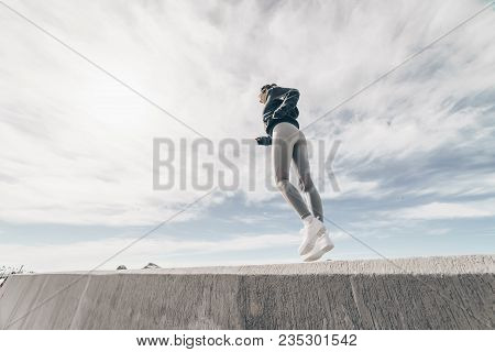 Active Young Girl Zealously Trains, Long Runs In The Open Air, Goes In For Sports