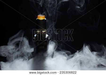 Vape Close-up In A Smoke On A Black Background