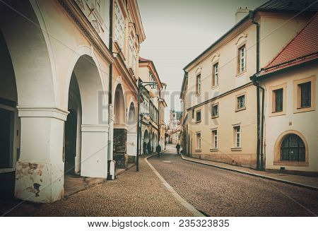 Narrow Medieval Streets In The Old Czech Town Of Kutna Hora. Photo With Vintage Effect