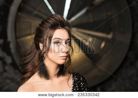 Portrait Of Beautiful Young Latina Woman With Perfect Make Up And Long Dark Hair Looking To Camera. 