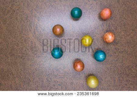 Colorful Decorative And Plain Easter Eggs Arranged In Random Circular Pattern On Green Grass. Close 