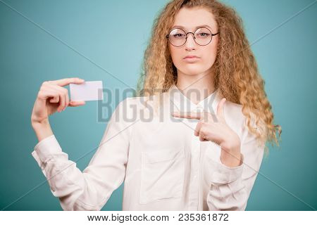 Young Pretty Female Giving Her Visiting Card. Medical Servicies. Car Repair Service