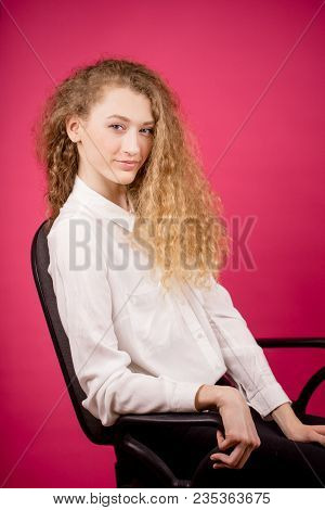 Close Up Portrait Of Pretty Boss With Fabulous Long Curly Hair. Wind-swept Hair-do