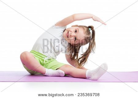 Child Girl Practicing Yoga, Stretching In Exercise Wearing Sportswear. Kid Isolated Over White Backg