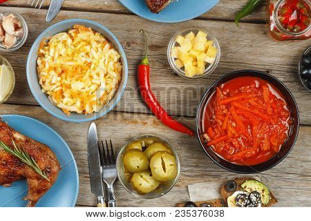 Dining Table. A Variety Of Food On A Wooden Table. View From Above, Rustic Style