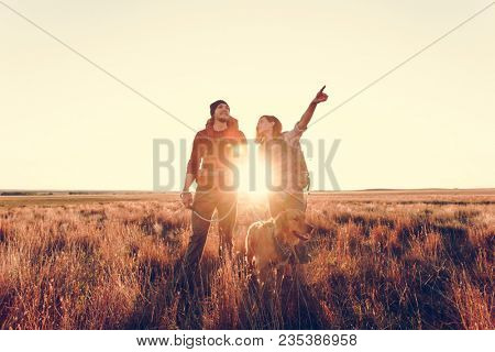 Couple hiking together in the wilderness