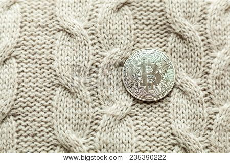 Bitcoin Coin On A Wool Background Close Up